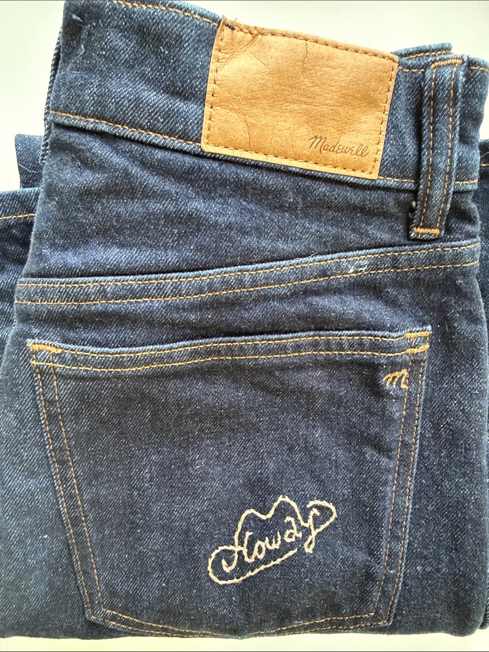 Madewell Dark Wash Denim Jeans with Tan Hand-embroidered Howdy stitching.